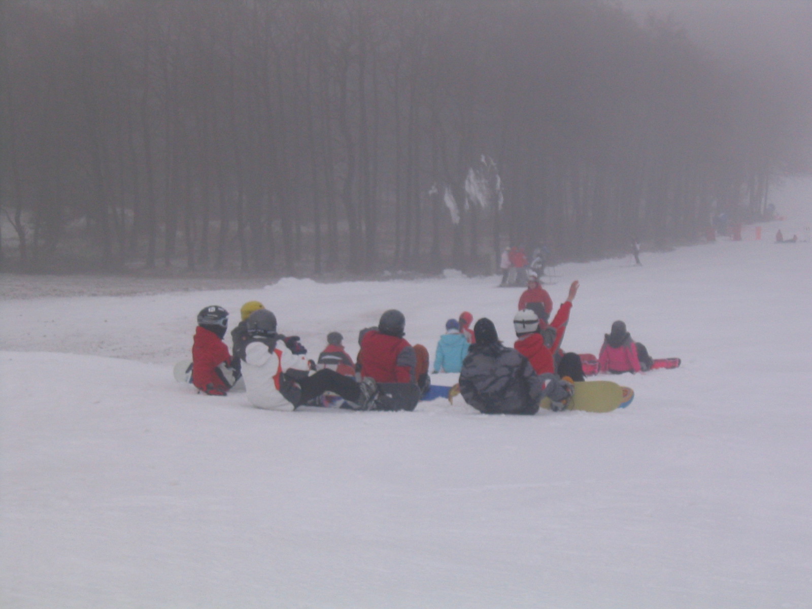 válečná porada snowboardistů